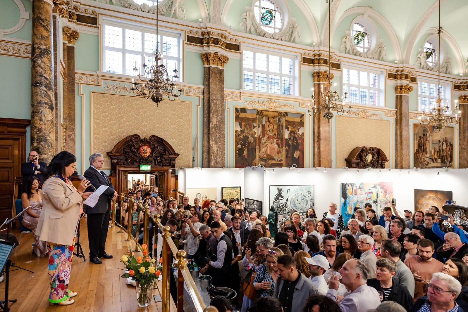 The awards ceremony at the 2023 edition, every seat and aisle taken.