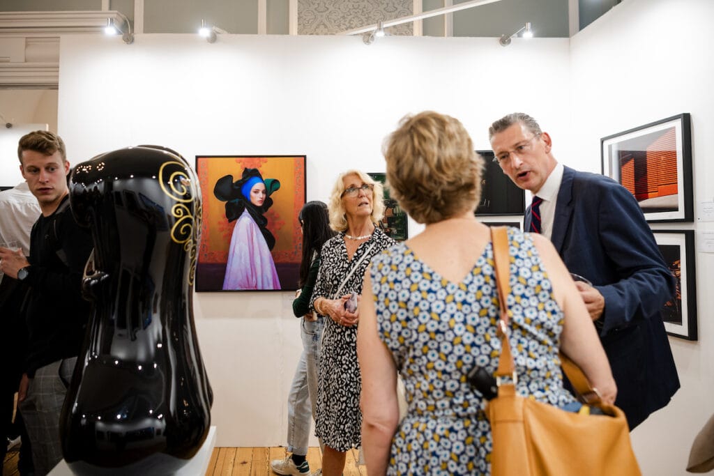 Guests among sculpture and photography at the 2023 edition.