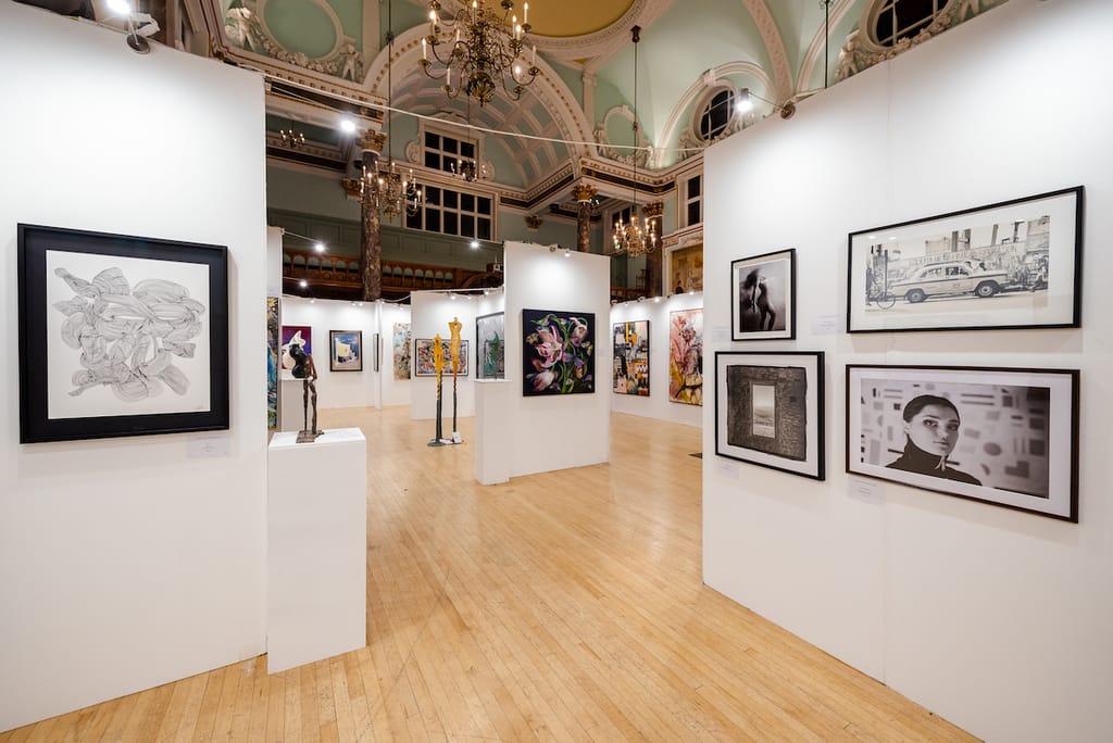 Works on paper along the exhibition walls at the 2023 edition.
